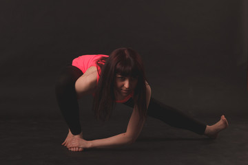 Fototapeta na wymiar Woman doing stretching exercises