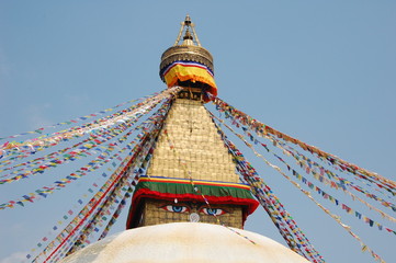 Bodnath stupa with Buddha eyes and prayer flags in Kathmandu, Nepal