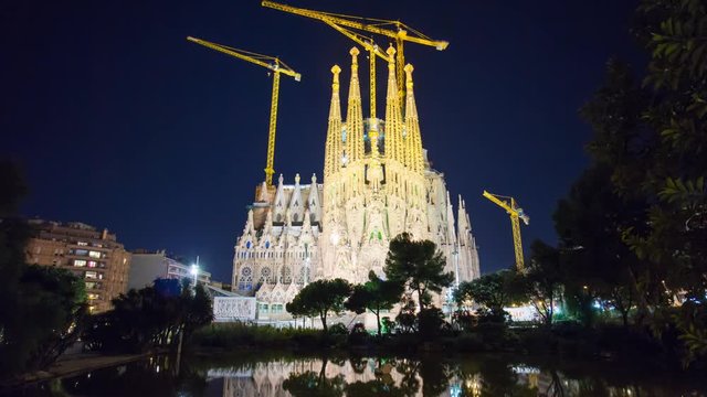 night light sagrada familia park pond view 4k time lapse spain barcelona
