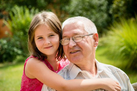 Happy grandfather with grandchild