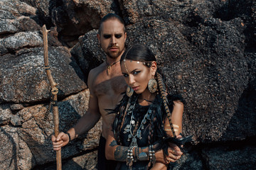tribal man and woman outdoors