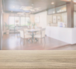 wooden table top and blur background living room in classic style interior