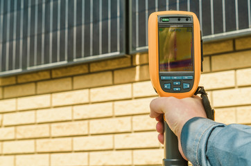 Thermal imaging of Photovoltaic Solar Panels on the Wall With Th