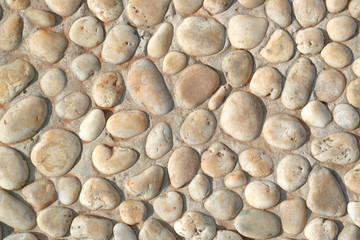 Fototapety  Biały kamień na betonowej ścianie, teksturowanej tle ściany.