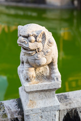 Fototapeta na wymiar Stone sculpture of chinese lion