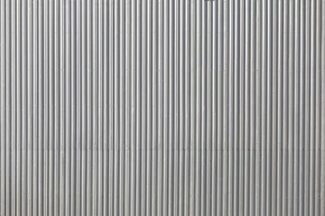 Fotobehang Corrugated metal roof picture taken from above, industrial background or texture. © MaciejBledowski