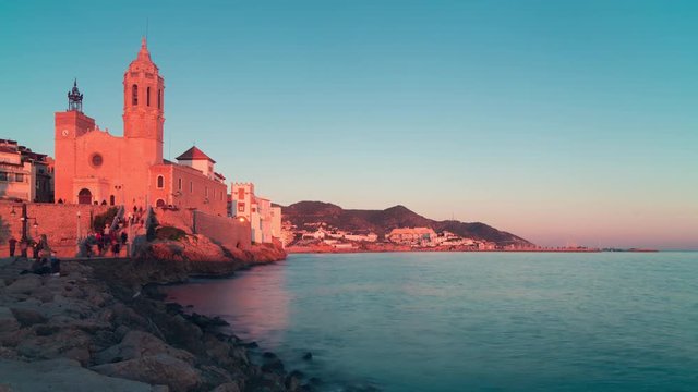 sitges sunset church bay view 4k time lapse spain
