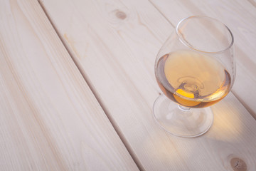 Brandy on light wood