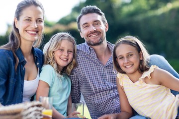 Portrait of happy family having a picnic