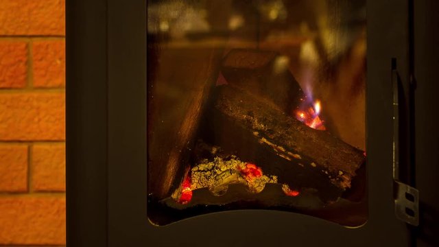 Firewood in the fireplace time lapse