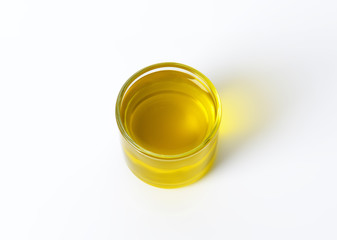 Glass of olive oil