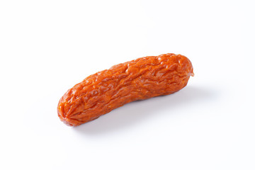Kielbasa sausage on white background