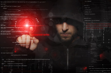 hacker at work with graphic user interface around