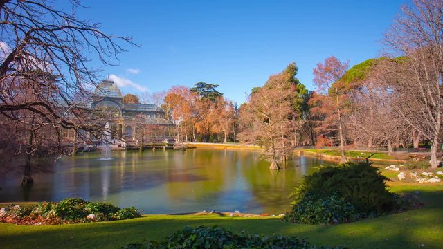 sunny day pond view on crystal palace 4k time lapse  spain madrid
