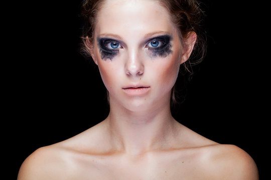 Gorgeous woman with black crying make up