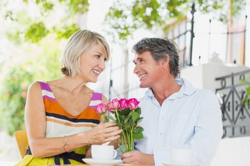 Fototapeta premium Happy couple sitting at cafe