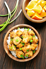 Asian dish chicken meat with orange sauce