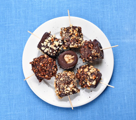 Frozen banana covered with chocolate