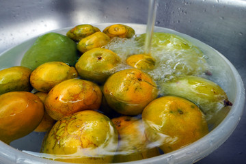 Wash the fruits in water