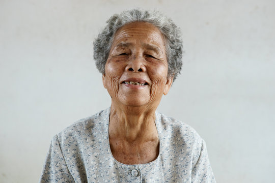 Smilling of happy Asian elderly senior on white background