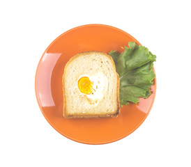 toast with an egg in the shape of a heart. Fried bread.