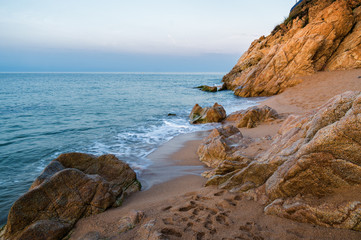 Sunrise on the beach of Calella near Barcelona, Spain.