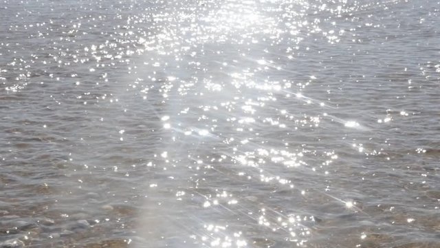 Shiny sparkles from sun reflection over sea water surface slow motion 1080p FullHD footage - Sparkling sea water beautiful summer background 1920X1080 HD slow-mo video 