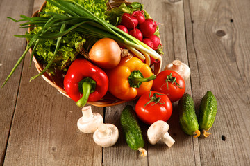 Vegetables . Fresh Bio Vegetable in a Basket. Over Nature Background