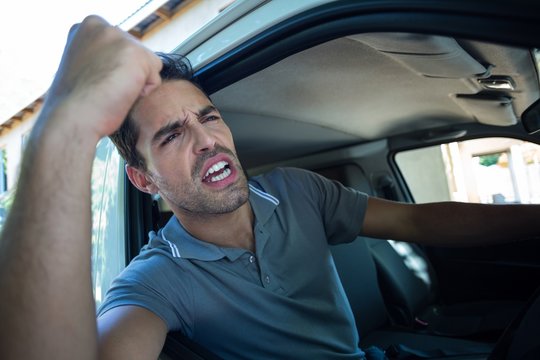 Frustrated driver with fist up