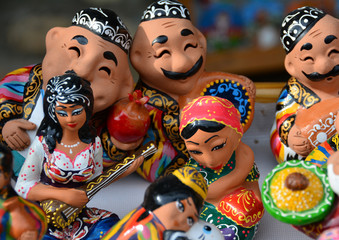 Happy uzbek ceramic statues