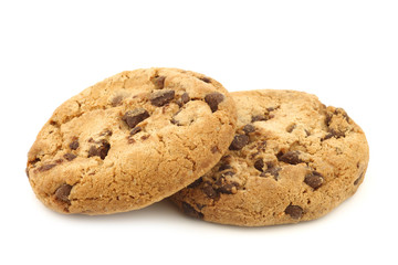 stacked crunchy chocolate chip cookies on a white background