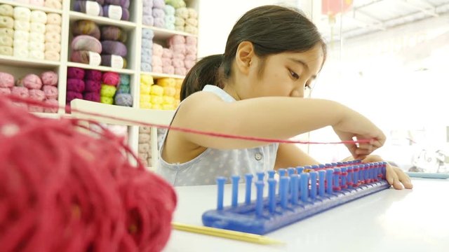4K :Asian girl practice to knitting by knitting box