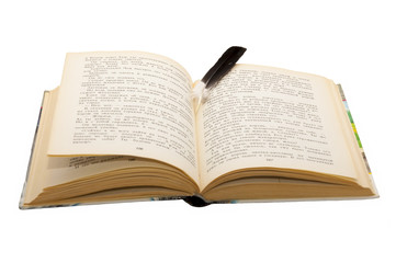 Obraz premium Open book/Open book with a large black bird's feather as a bookmark between the pages , on a white background