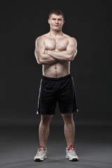 Obraz premium Sporty and healthy man isolated on black background