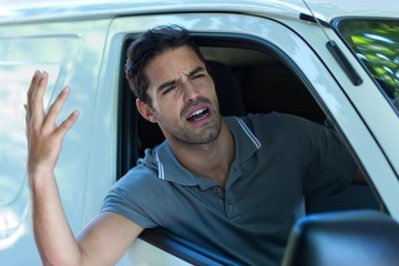 Irritated man gesturing 