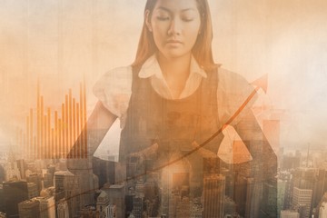 Obraz premium Composite image of businesswoman using crystal ball