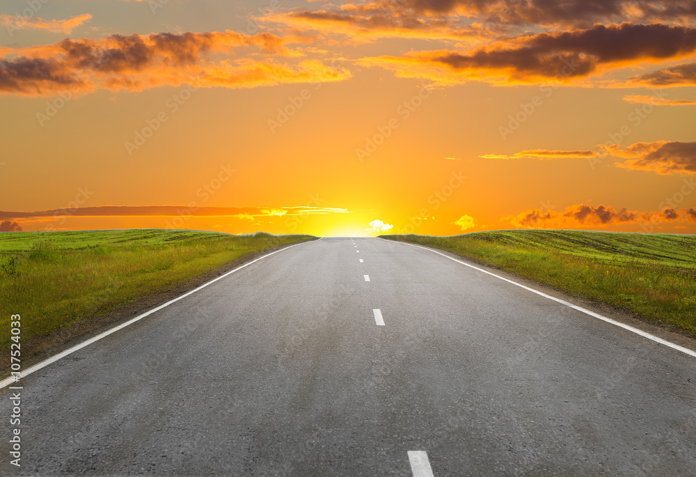 Wall mural sunset over the country highway