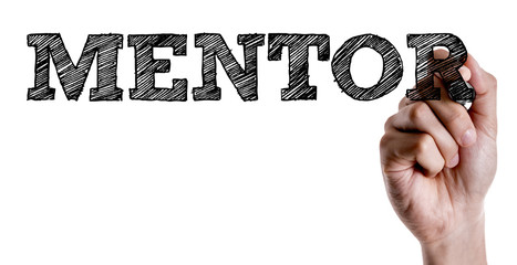 Hand writing the text: Mentor