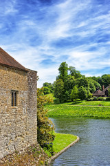 Fototapeta na wymiar Fragment of Leeds Castle in a lake in Kent in England