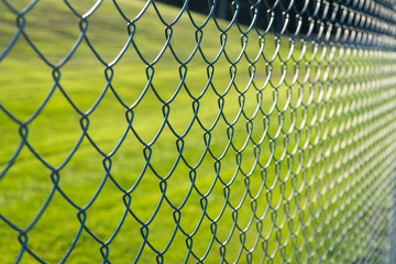wire mesh and green background - 107525298