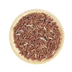 Brown rice in wooden bowl on white background