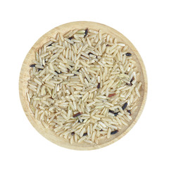 Brown rice in wooden bowl on white background