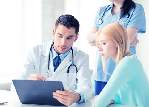 Male Doctor With Patient