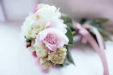 Closeup of fresh white & pink flowers in wedding bouquet
