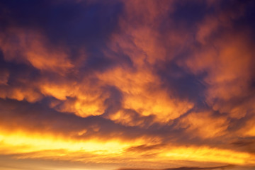 Beautiful stormy sunset sky. Cloudy abstract background. Sunset