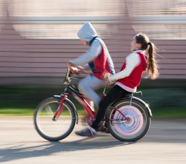 Children riding a bike
