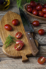 fresh, juicy and delicious tomatoes on a chopping board