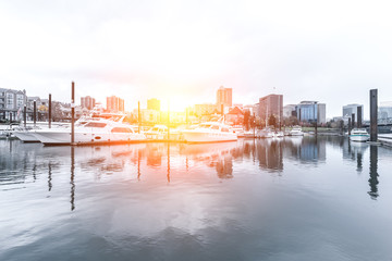 Fototapeta premium yacht on water with cityscape and skyline in portland
