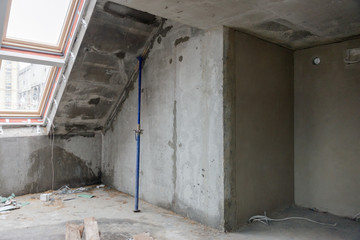 Rebuilding apartments. The room during renovation. Concrete interior. Development.