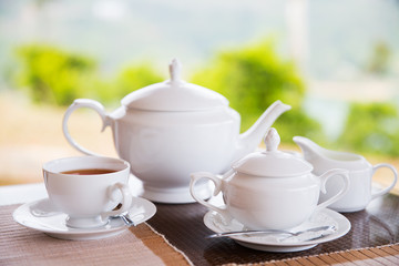 close up of tea service at restaurant or teahouse